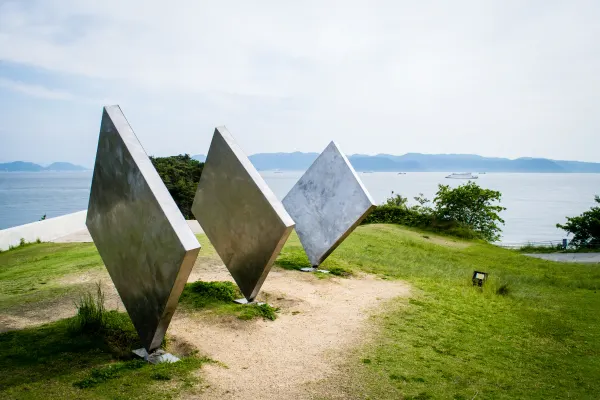 Angular metal sculptures overlooking the coast