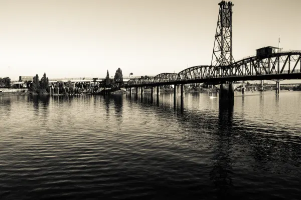 Steel Bridge reflected in the Willamette River