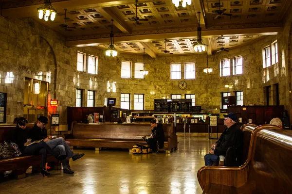 Warm light inside a railway station waiting room