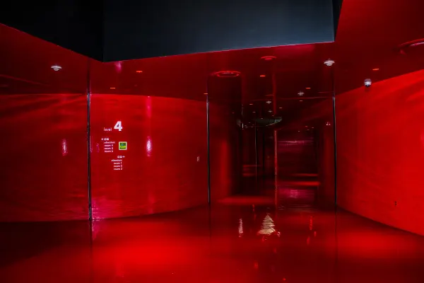 A vivid red corridor inside the library