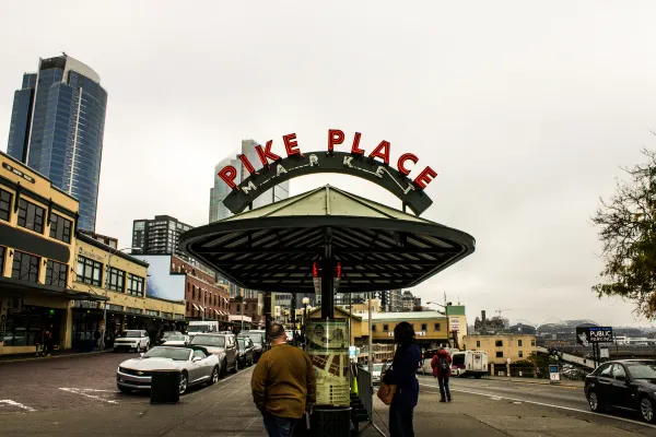The Pike Place Market entrance beneath a cloudy sky