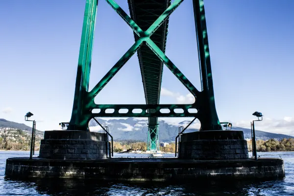 Green steel supports beneath Lions Gate Bridge