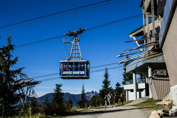 A gondola suspended above a mountain station