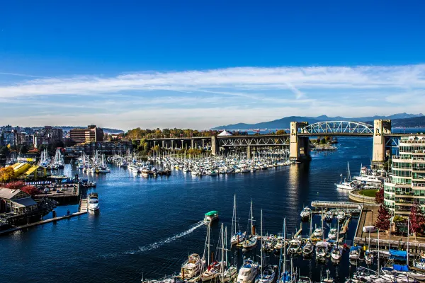 Boats and waterfront buildings around False Creek