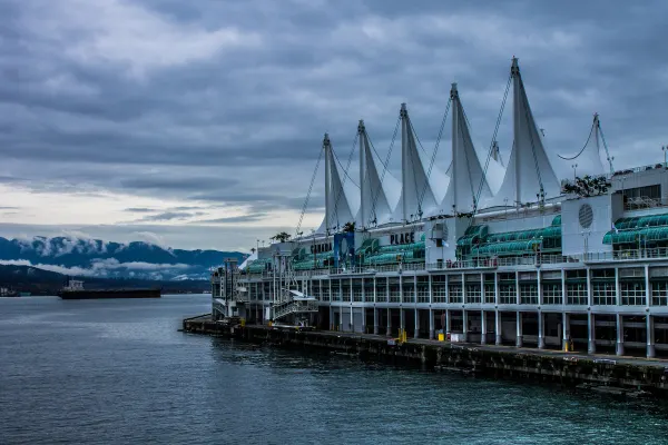 The white sails of Canada Place beneath dramatic clouds